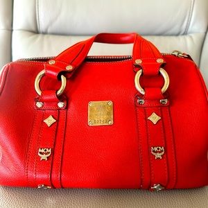 Beautiful Authentic leather MCM boston bag. Rare red color collection.